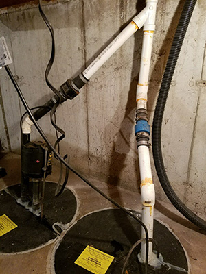 Dual Sump Pump Before Service - Residential Plumbing